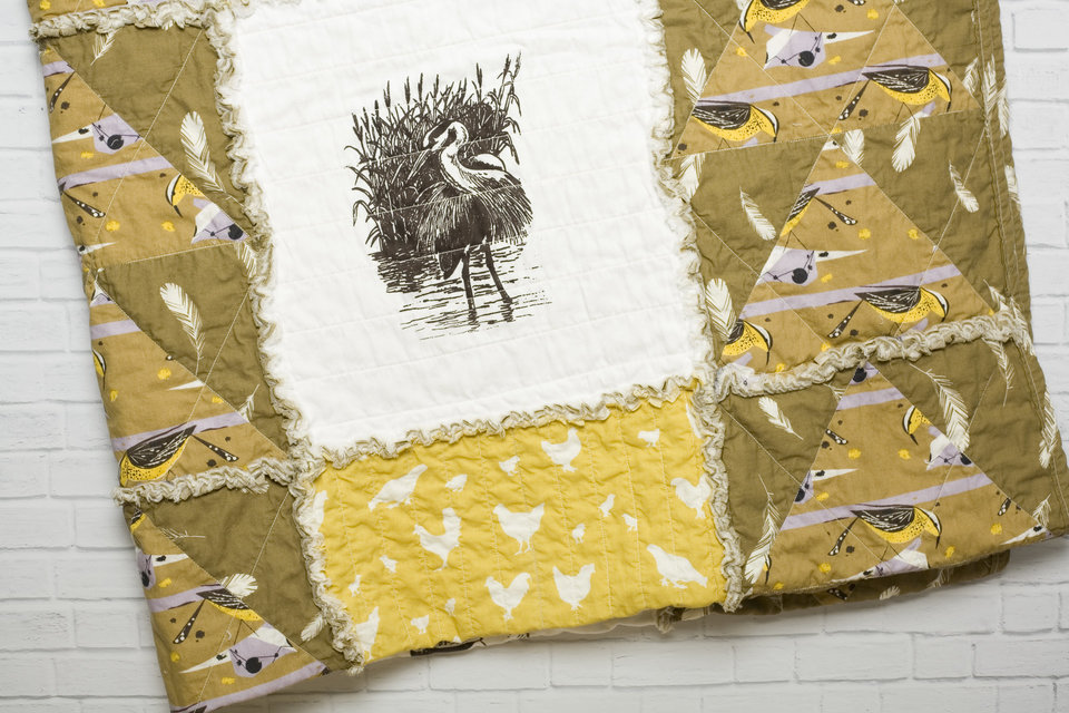 organic cotton rag quilt with screen printed great blue heron