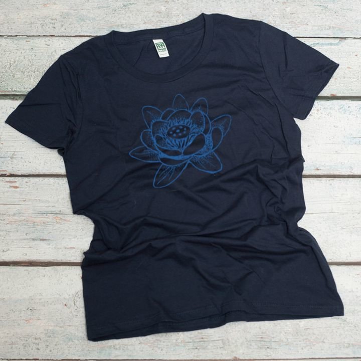 lotus flower screen printed in blue on an ocean blue women's organic cotton tee