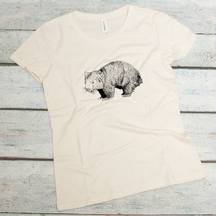 wombat screen printed in black on a natural colored women's organic cotton tee