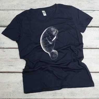 Florida manatee screen printed in white on an ocean blue women's organic cotton tee