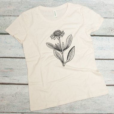 sea daisy flower screen printed in black on a natural colored women's organic cotton t-shirt